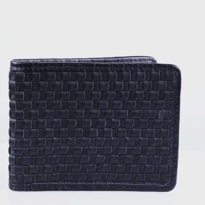 A close-up video demonstration of the Luvetto trifold wallet, highlighting its natural leather patina, flexibility, and handmade construction.